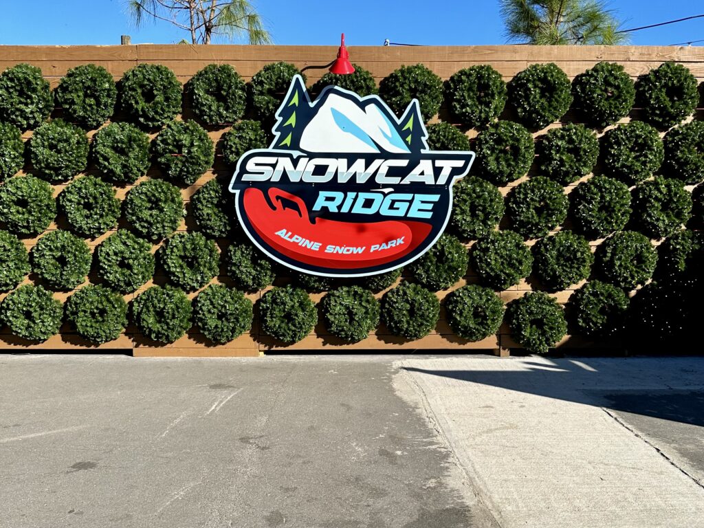 Selfie wall inside Snowcat Ridge - A Brutally Honest Review - unofficialflorida.com.